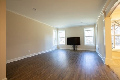 Discover relaxed, resort-style living in this charming on Lanier Island Legacy Golf Couorse in Georgia - for sale on GolfHomes.com, golf home, golf lot