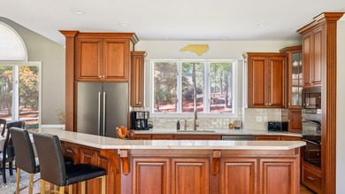 Beautifully positioned on a private, oversized lot near on Pinewild Country Club of Pinehurst in North Carolina - for sale on GolfHomes.com, golf home, golf lot