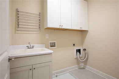 Discover relaxed, resort-style living in this charming on Lanier Island Legacy Golf Couorse in Georgia - for sale on GolfHomes.com, golf home, golf lot