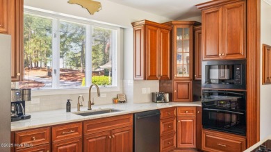 Beautifully positioned on a private, oversized lot near on Pinewild Country Club of Pinehurst in North Carolina - for sale on GolfHomes.com, golf home, golf lot