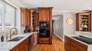 Beautifully positioned on a private, oversized lot near on Pinewild Country Club of Pinehurst in North Carolina - for sale on GolfHomes.com, golf home, golf lot