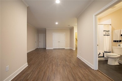 Discover relaxed, resort-style living in this charming on Lanier Island Legacy Golf Couorse in Georgia - for sale on GolfHomes.com, golf home, golf lot