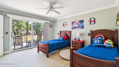 Beautifully positioned on a private, oversized lot near on Pinewild Country Club of Pinehurst in North Carolina - for sale on GolfHomes.com, golf home, golf lot