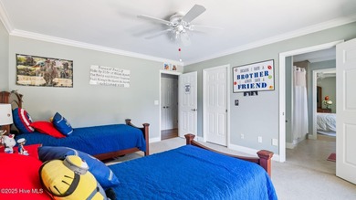 Beautifully positioned on a private, oversized lot near on Pinewild Country Club of Pinehurst in North Carolina - for sale on GolfHomes.com, golf home, golf lot