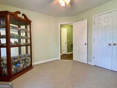 Welcome to 2156 Racoon Court, located in Mirror Lake, a 36 holes on Mirror Lake Golf Club in Georgia - for sale on GolfHomes.com, golf home, golf lot