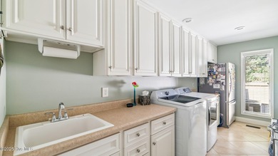 Beautifully positioned on a private, oversized lot near on Pinewild Country Club of Pinehurst in North Carolina - for sale on GolfHomes.com, golf home, golf lot