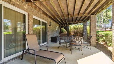 Beautifully positioned on a private, oversized lot near on Pinewild Country Club of Pinehurst in North Carolina - for sale on GolfHomes.com, golf home, golf lot