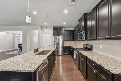Once a model home, this beautifully designed ranch is spacious on The Fairways at Laurel Canyon in Georgia - for sale on GolfHomes.com, golf home, golf lot