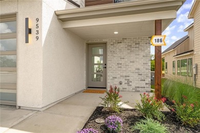 Discover modern, low-maintenance luxury living in this stunning on The Golf Club of Kansas in Kansas - for sale on GolfHomes.com, golf home, golf lot