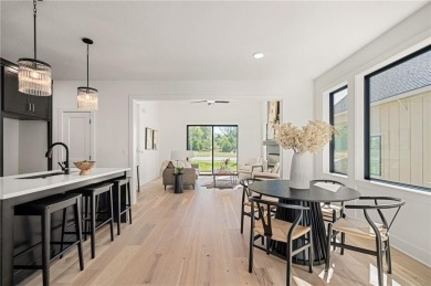 Discover modern, low-maintenance luxury living in this stunning on The Golf Club of Kansas in Kansas - for sale on GolfHomes.com, golf home, golf lot