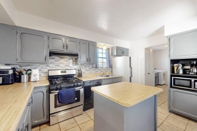 This property offers nearly 1/4 of an acre lot in a golf course on Tierra Del Sol Golf Course in New Mexico - for sale on GolfHomes.com, golf home, golf lot