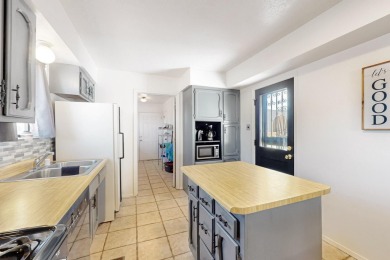 This property offers nearly 1/4 of an acre lot in a golf course on Tierra Del Sol Golf Course in New Mexico - for sale on GolfHomes.com, golf home, golf lot