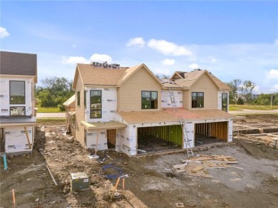 Discover modern, low-maintenance luxury living in this stunning on The Golf Club of Kansas in Kansas - for sale on GolfHomes.com, golf home, golf lot