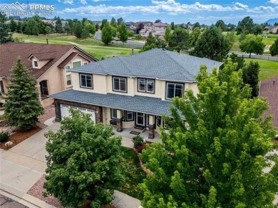 This beautiful home overlooking Pine Creek Golf Course is on Pine Creek Golf Club in Colorado - for sale on GolfHomes.com, golf home, golf lot