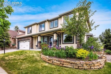 This beautiful home overlooking Pine Creek Golf Course is on Pine Creek Golf Club in Colorado - for sale on GolfHomes.com, golf home, golf lot