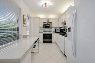 Absolutely Beautiful and bright, Garden-View Condo located at on Quail Ridge Golf Course and Country Club in Florida - for sale on GolfHomes.com, golf home, golf lot