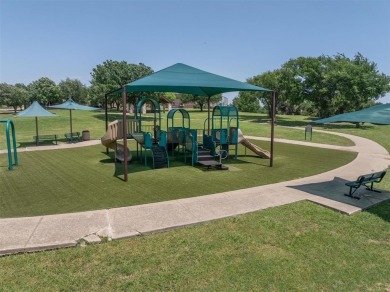 Tucked alongside a serene pond and scenic community trail, this on Coyote Ridge Golf Club in Texas - for sale on GolfHomes.com, golf home, golf lot