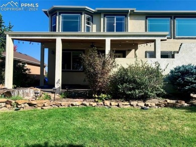 This beautiful home overlooking Pine Creek Golf Course is on Pine Creek Golf Club in Colorado - for sale on GolfHomes.com, golf home, golf lot