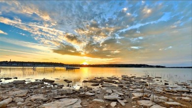 The back porch to this lake house has some of the prettiest on Hideout Golf Club and Resort  in Texas - for sale on GolfHomes.com, golf home, golf lot