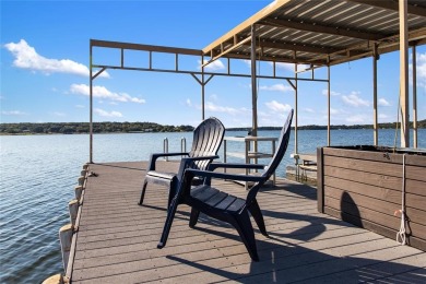 The back porch to this lake house has some of the prettiest on Hideout Golf Club and Resort  in Texas - for sale on GolfHomes.com, golf home, golf lot