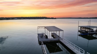 The back porch to this lake house has some of the prettiest on Hideout Golf Club and Resort  in Texas - for sale on GolfHomes.com, golf home, golf lot