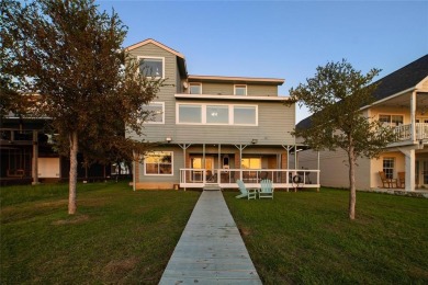 The back porch to this lake house has some of the prettiest on Hideout Golf Club and Resort  in Texas - for sale on GolfHomes.com, golf home, golf lot