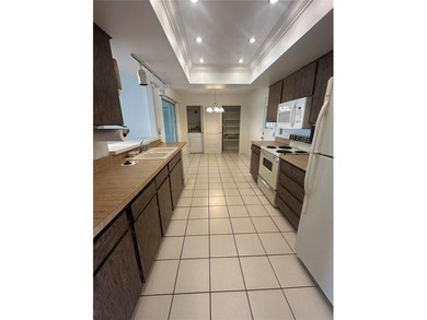 Discover effortless Florida living in this beautifully on Mainlands Golf Club in Florida - for sale on GolfHomes.com, golf home, golf lot