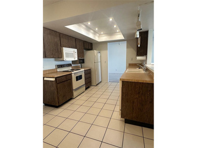 Discover effortless Florida living in this beautifully on Mainlands Golf Club in Florida - for sale on GolfHomes.com, golf home, golf lot