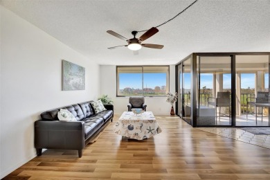 This 6th floor corner condo boasts a spacious open floor plan on Isla Del Sol Yacht and Country Club in Florida - for sale on GolfHomes.com, golf home, golf lot