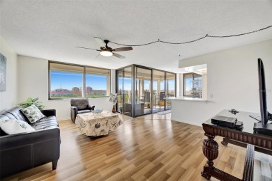 This 6th floor corner condo boasts a spacious open floor plan on Isla Del Sol Yacht and Country Club in Florida - for sale on GolfHomes.com, golf home, golf lot