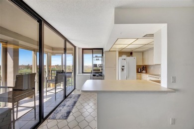 This 6th floor corner condo boasts a spacious open floor plan on Isla Del Sol Yacht and Country Club in Florida - for sale on GolfHomes.com, golf home, golf lot