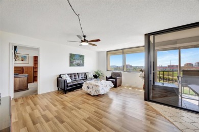 This 6th floor corner condo boasts a spacious open floor plan on Isla Del Sol Yacht and Country Club in Florida - for sale on GolfHomes.com, golf home, golf lot