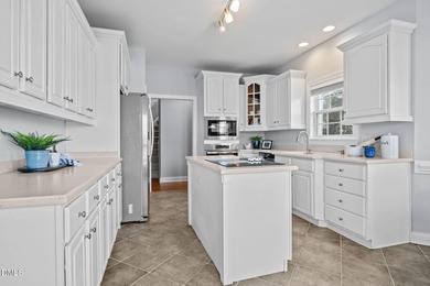 Enjoy stunning 16th fairway views from this beautifully designed on Eagle Ridge Golf Course in North Carolina - for sale on GolfHomes.com, golf home, golf lot