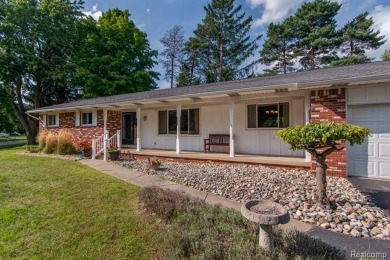 Welcome to your dream home! This stunning move-in ready on Corunna Hills Golf Course in Michigan - for sale on GolfHomes.com, golf home, golf lot