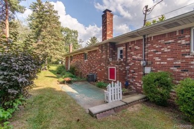 Welcome to your dream home! This stunning move-in ready on Corunna Hills Golf Course in Michigan - for sale on GolfHomes.com, golf home, golf lot