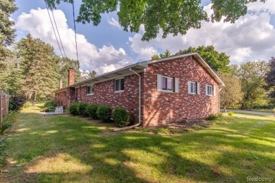 Welcome to your dream home! This stunning move-in ready on Corunna Hills Golf Course in Michigan - for sale on GolfHomes.com, golf home, golf lot