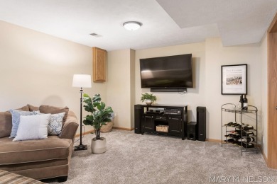 Don't miss this spacious and METICULOUSLY cared for home located on Maple Hill Golf Course in Michigan - for sale on GolfHomes.com, golf home, golf lot