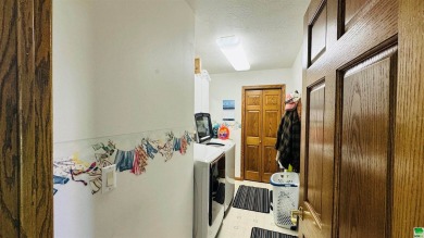 Beautiful 3-bedroom home in Hinton, IA located right on the golf on Deer Run Golf Course in Iowa - for sale on GolfHomes.com, golf home, golf lot