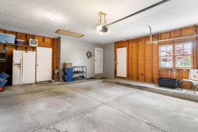 Don't miss this spacious and METICULOUSLY cared for home located on Maple Hill Golf Course in Michigan - for sale on GolfHomes.com, golf home, golf lot