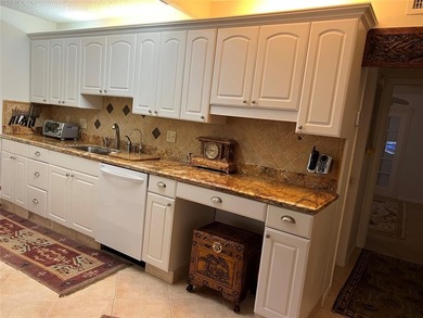 RENOVATED,FRESH PAINT, EXPANSIVE WATER VIEW, WALK TO HOUSES OF on Hillsboro Pines Golf in Florida - for sale on GolfHomes.com, golf home, golf lot