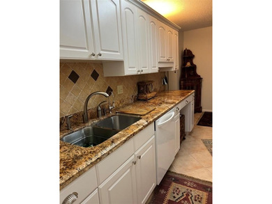 RENOVATED,FRESH PAINT, EXPANSIVE WATER VIEW, WALK TO HOUSES OF on Hillsboro Pines Golf in Florida - for sale on GolfHomes.com, golf home, golf lot