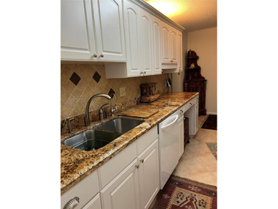 RENOVATED,FRESH PAINT, EXPANSIVE WATER VIEW, WALK TO HOUSES OF on Hillsboro Pines Golf in Florida - for sale on GolfHomes.com, golf home, golf lot