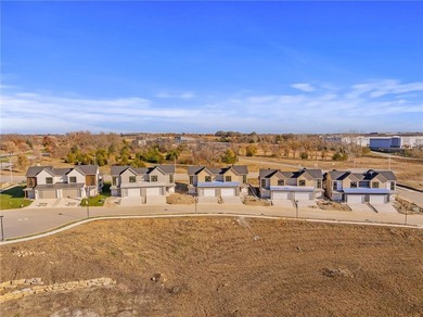 Discover modern, low-maintenance living in this stunning 1 on The Golf Club of Kansas in Kansas - for sale on GolfHomes.com, golf home, golf lot