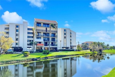 Under contract-accepting backup offers. Experience tranquility on Isla Del Sol Yacht and Country Club in Florida - for sale on GolfHomes.com, golf home, golf lot