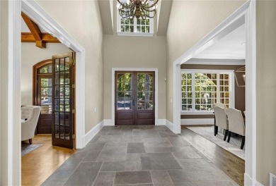 Nestled on a private cul-de-sac, this custom-designed estate on Chestatee Golf Club in Georgia - for sale on GolfHomes.com, golf home, golf lot