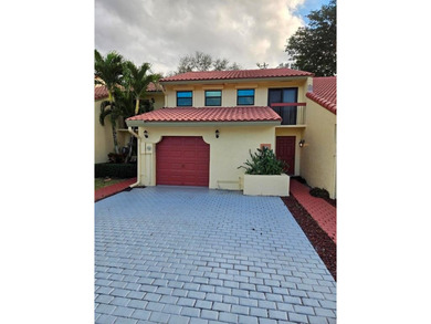 3/2.5 Alhambra Townhome, just under 1900sq ft, waterfront & on Pine Island Ridge Country Club in Florida - for sale on GolfHomes.com, golf home, golf lot