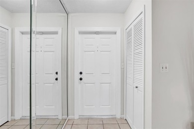 3/2.5 Alhambra Townhome, just under 1900sq ft, waterfront & on Pine Island Ridge Country Club in Florida - for sale on GolfHomes.com, golf home, golf lot