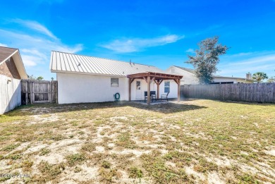 Discover your coastal retreat at Seaclusion Beach, located on Holiday Golf Club in Florida - for sale on GolfHomes.com, golf home, golf lot