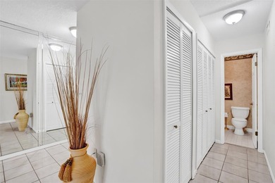 3/2.5 Alhambra Townhome, just under 1900sq ft, waterfront & on Pine Island Ridge Country Club in Florida - for sale on GolfHomes.com, golf home, golf lot