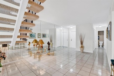 3/2.5 Alhambra Townhome, just under 1900sq ft, waterfront & on Pine Island Ridge Country Club in Florida - for sale on GolfHomes.com, golf home, golf lot